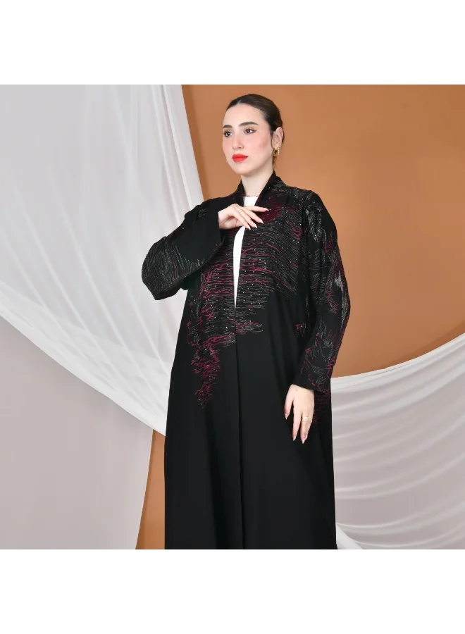 HAWRAA ABAYA Black wrap abaya with a flowing cut, gold and burgundy embroidery, decorated with stones