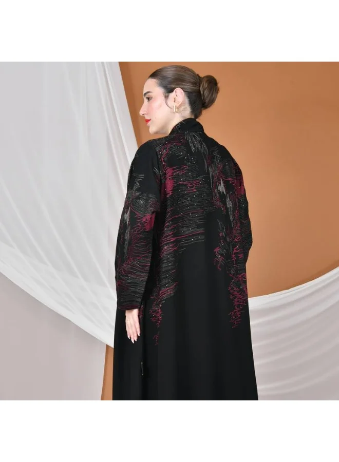 HAWRAA ABAYA Black wrap abaya with a flowing cut, gold and burgundy embroidery, decorated with stones
