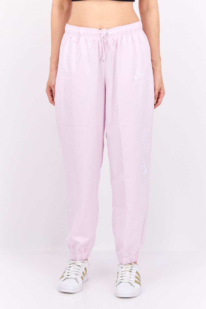 Nike Women Sportswear Fit Outdoor Sweatpants, Lavender - Image 1