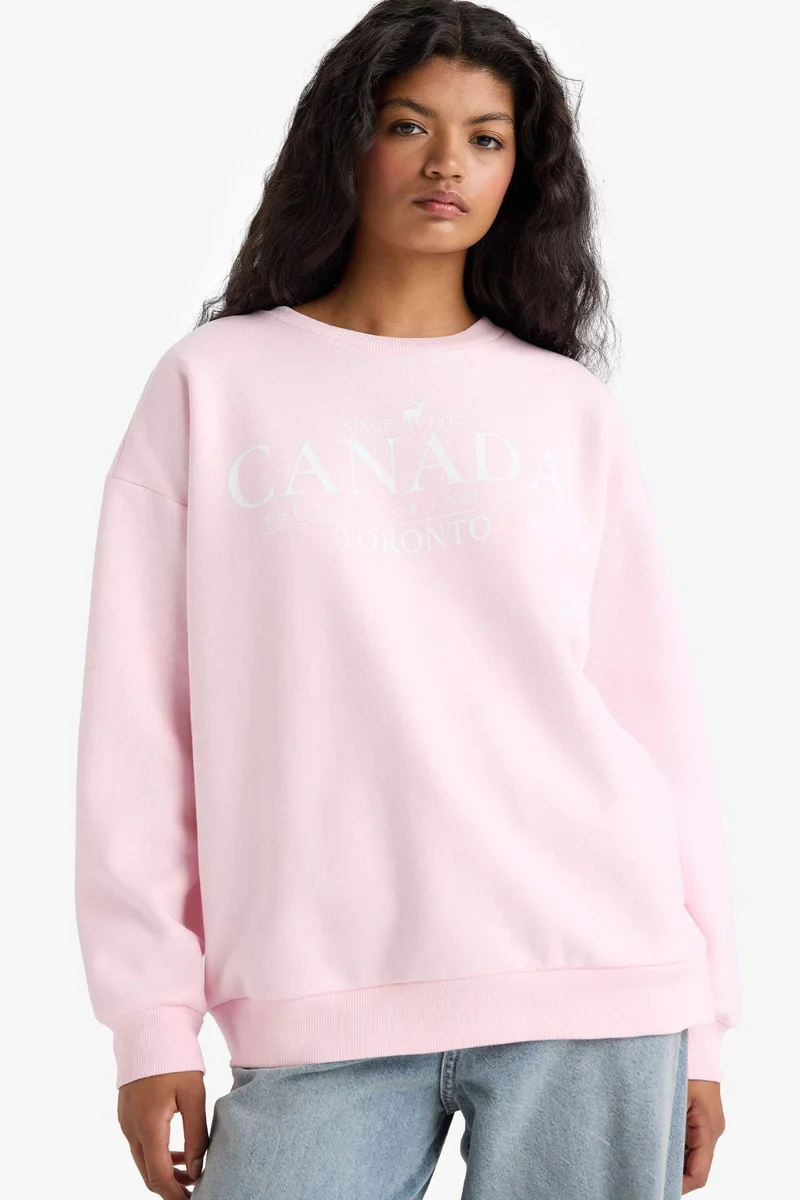 ديفاكتو Oversize Printed Long Sleeve Sweatshirt