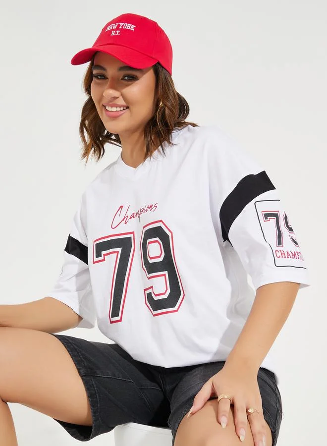 Styli Oversized Slogan Print V Neck T-Shirt with Exaggerated Sleeve