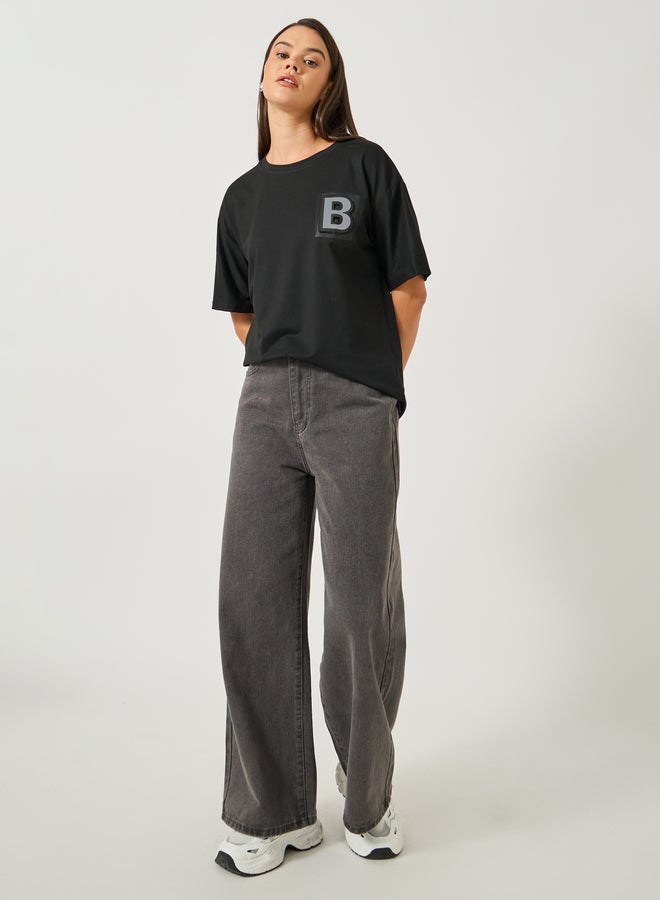 Styli Solid Round Neck T-Shirt with Badge Detail - Image 2