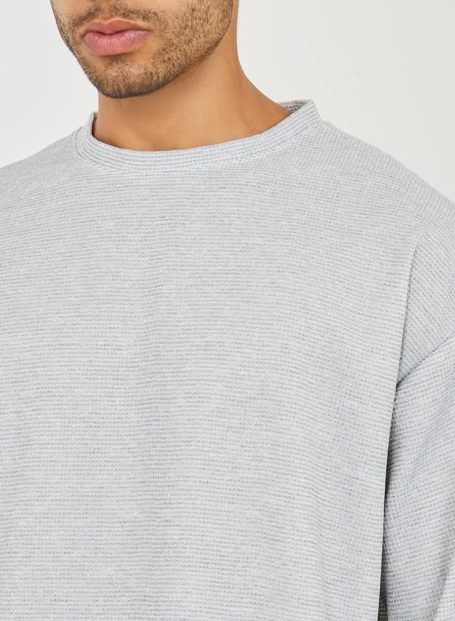 ستايلي Solid Textured Knit Oversized Streetwear T-Shirt & Shorts Set