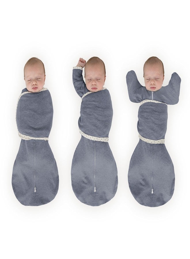 سوادل ديزاينز كيس لفّ الأطفال من SwaddleDesigns بستة أوضاع، مع إمكانية رفع الذراعين، مناسب للمواليد الجدد، يوفر خيارات متعددة لتهدئة ردة الفعل المفاجئة، ويحسن النوم، ويسهل الانتقال بين مراحل النوم المختلفة. كيس نوم صغير، مناسب للأطفال من عمر 0-3 أشهر، وزن 6-12 رطلاً، مصنوع من قماش الدنيم الممزوج. - Image 1