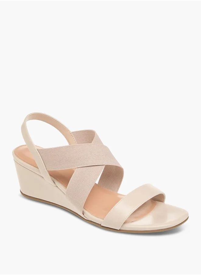 سيليست Women's Solid Cross Strap Sandals with Wedge Heels