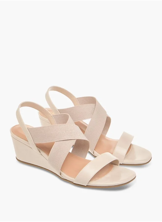 سيليست Women's Solid Cross Strap Sandals with Wedge Heels