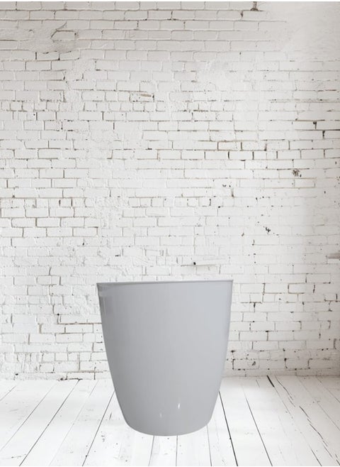 A circular plastic tree stand with an elegant design