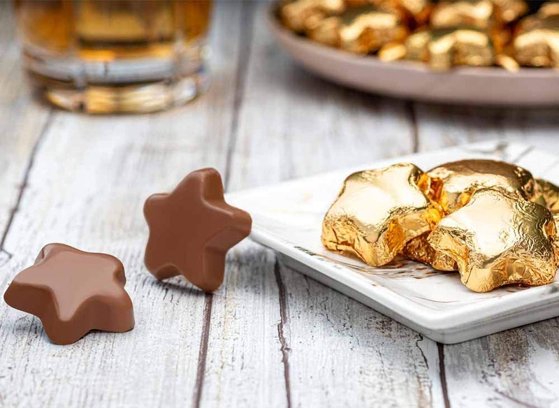 Madelaine Chocolate Gold Stars - Christmas Candy Party Favors - 24 Milk Chocolate Candy Individually Wrapped In Gold Foil for Party Decorations 8 Oz Bag - Image 2