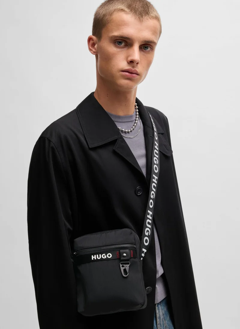 HUGO Reporter bag with branded adjustable strap and zip closure
