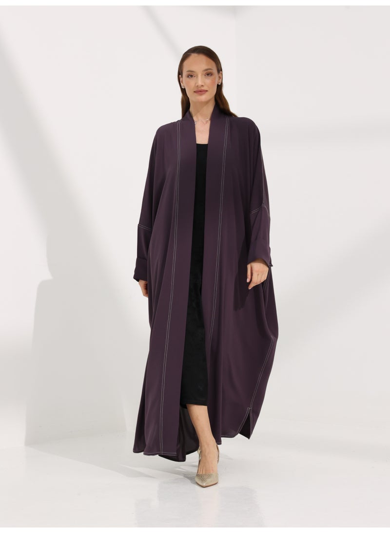 Khan&Co. Seven Seas Ube Cake Abaya in purple crepe fabric with two gold KHAN&CO logo buttons - Designed by Abdullah Khan - Image 1