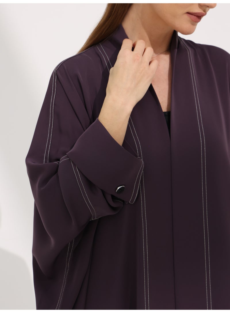 Khan&Co. Seven Seas Ube Cake Abaya in purple crepe fabric with two gold KHAN&CO logo buttons - Designed by Abdullah Khan - Image 4