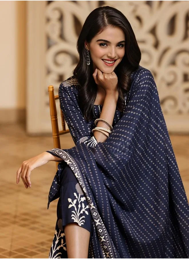 آي شين Elastic Women Navy Cotton Kurta Set with Embroidered pattern Tunic and Palazzo features a Round neckline and Three-Fourth Sleeve secured with Elastic closure and styled in Straight Fit ideal for Festive moments — exude elegance in every glance.