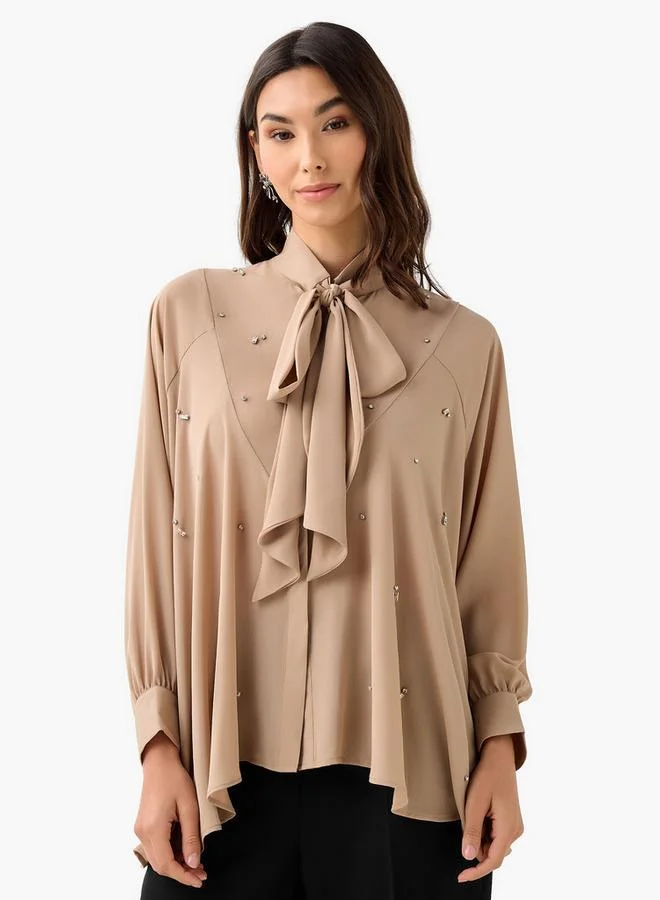 ايكونيك توب أيقوني بقصة مريحة وزخارف حجر الراين