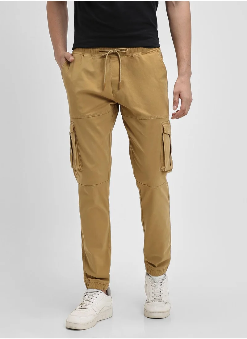 دينيس لينغو Khaki Slim Fit Solid Trouser for Men - Cotton Blend, Full Length, Button & Zip, Mid Rise, Casual