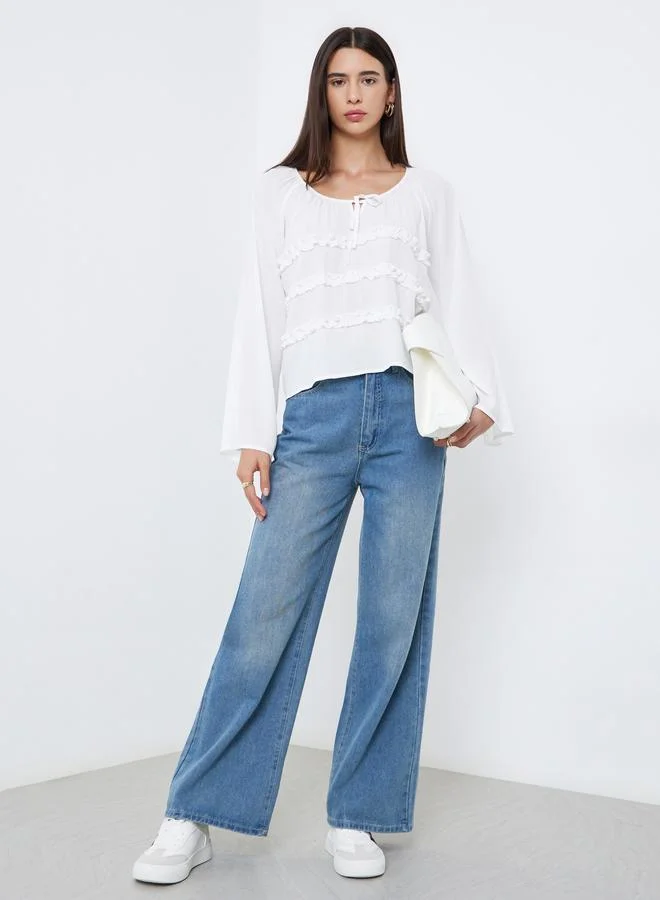 تايك تو بلوزة بتفاصيل كشكش وأكمام جرس