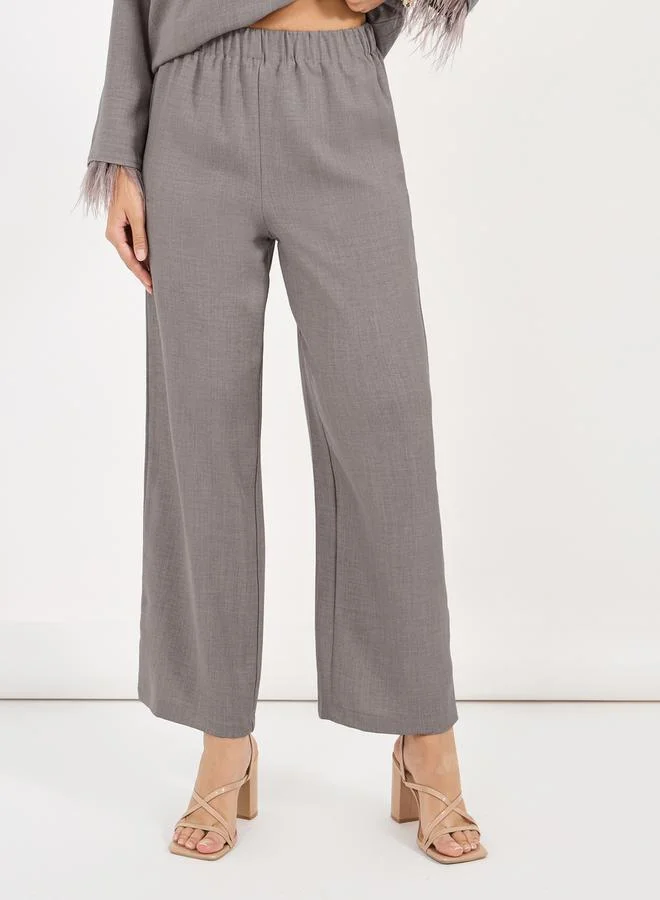 Styli Solid Top with feather trim Sleeves & Wide Leg Pants Co-Ords Set