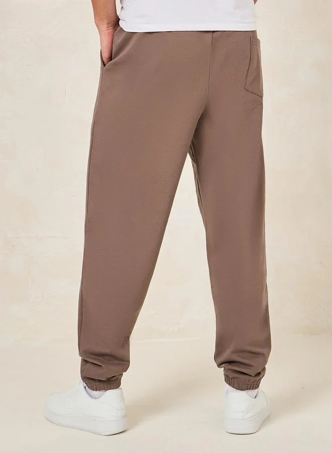 Styli Minimal Print Oversized Joggers with Elasticated Hem