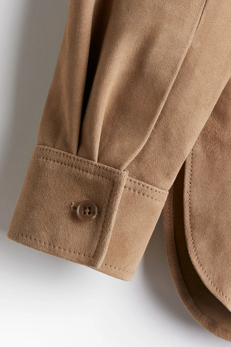 اتش اند ام بلوزة من الجلد السويدي