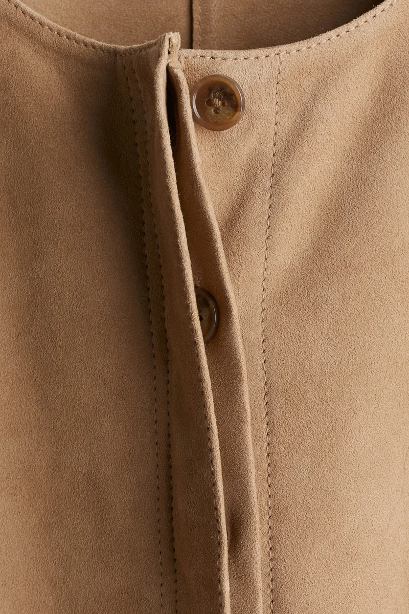 اتش اند ام بلوزة من الجلد السويدي