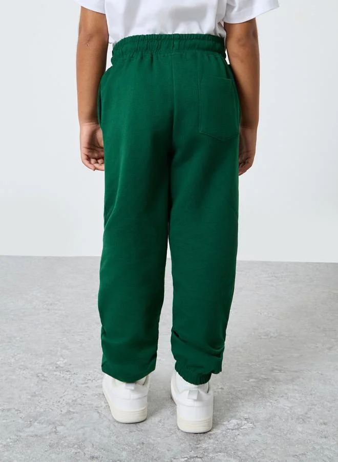 Styli Green Cotton Cuffed Joggers with Pockets