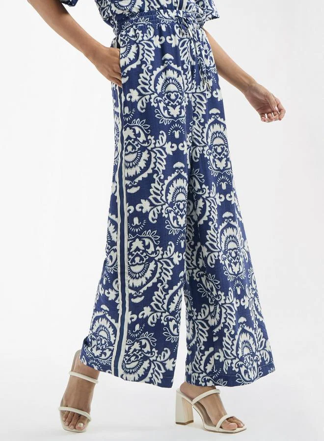Splash FAV All-Over Print Wide Leg Pants with Drawstring Closure and Pockets