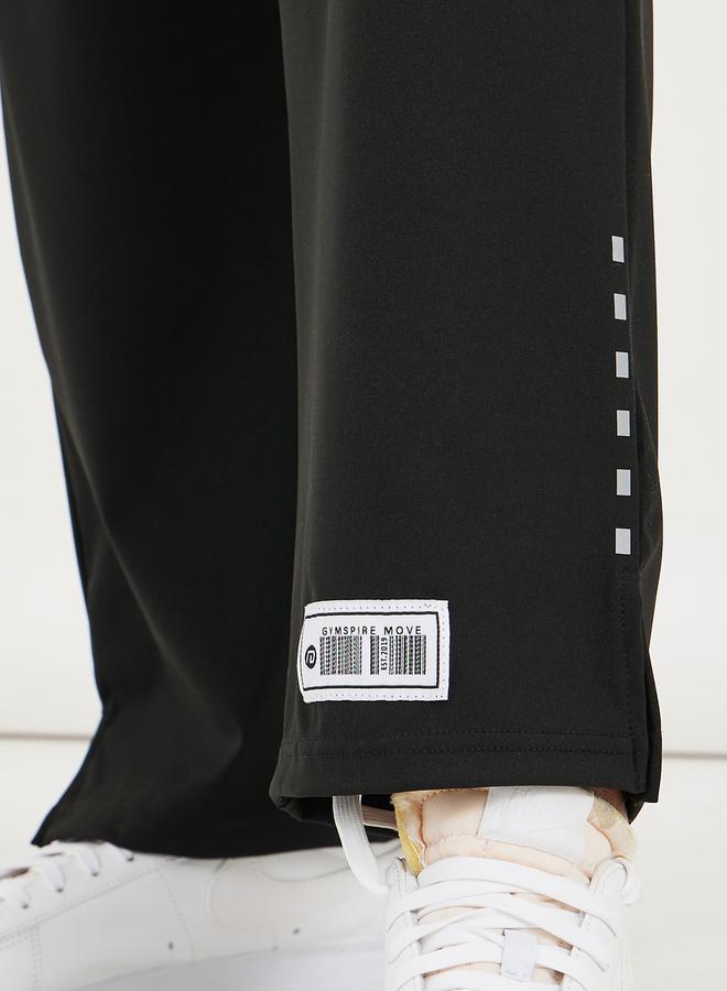 ستايلي سراويل مستقيمة بخصر مطاطي وشريط عاكس منقط بإصدار جيم سباير - Image 5