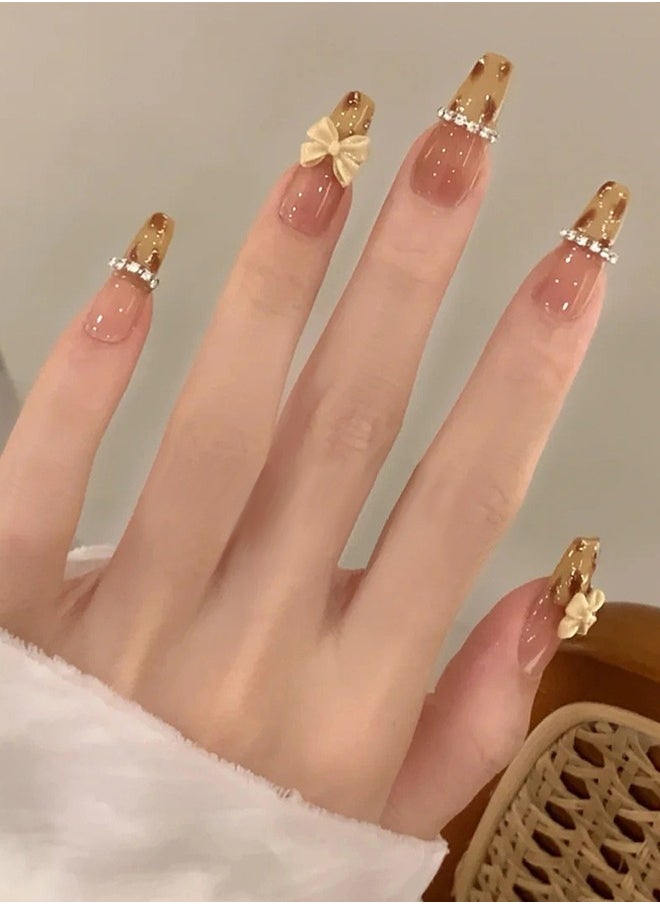 NIBEMINENT 24Pcs Fake Nails, Press Nails In Box,Long-length Flat head shaped Solid Brown Color Shiny Nail Art,Bow knot Zircon,Leopard print Speckle,Fake Nail Patch  - Image 1
