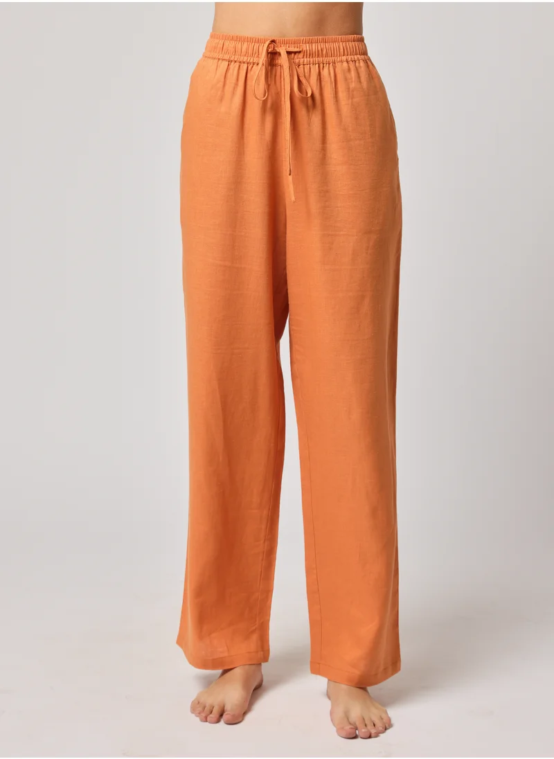 أشيتا فرنانديز Ashita Fernandes Khwaab Orange Linen Blend Trousers for Women– Lightweight, Breathable, Timeless Casual & Resort Wear