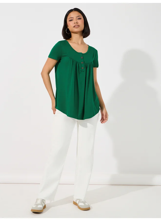 Aria Romance ARIA ROMANCE Solid Round Neck Curved Hem Top