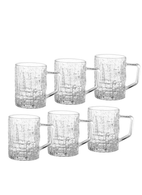 Set of 6 glass cups With side engravings that add more From the aesthetic to the shape of the cup.     Capacity 400ml Height 8.5 cm.