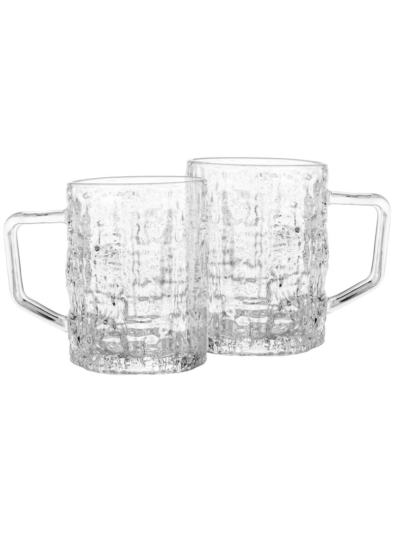 Set of 6 glass cups With side engravings that add more From the aesthetic to the shape of the cup.     Capacity 400ml Height 8.5 cm.