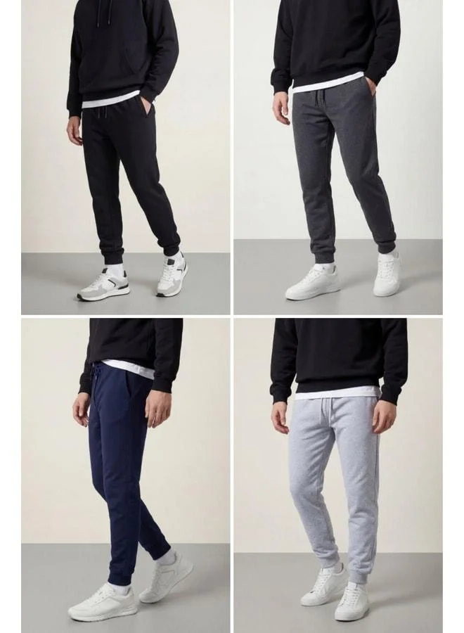 Mmetalic Men's Black, Navy, Anthracite, Gray Back Pocket Tag Detailed Leg Elastic Regular Fit 4-Piece Tracksuit Bottom.