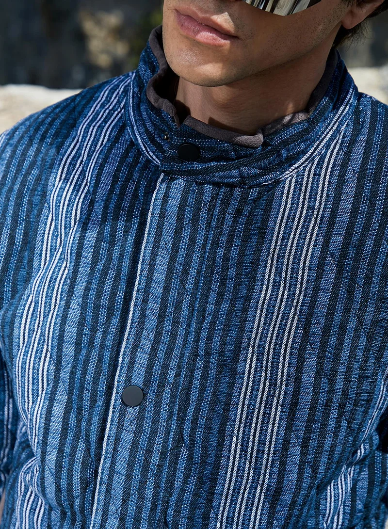 Campus Sutra Men's Black & Prussian Blue Striped Quilted Bomber Jacket