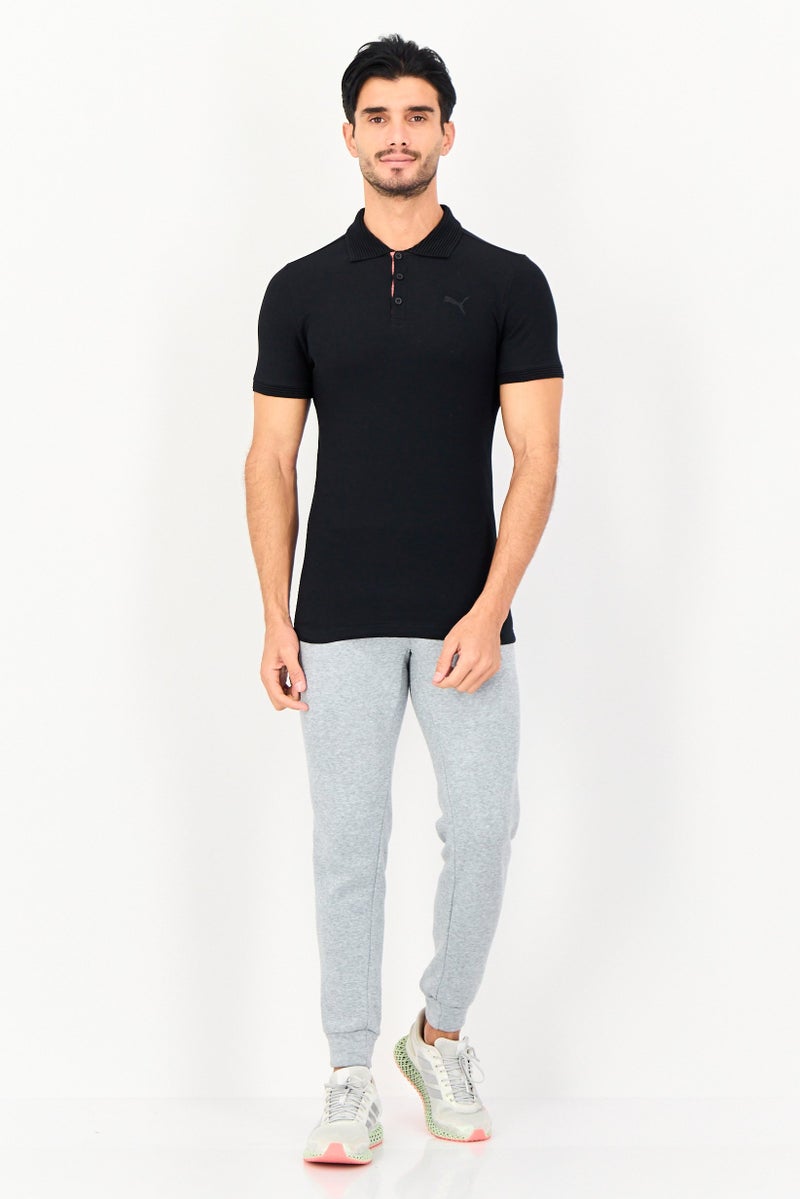 PUMA Men Slim Fit Short Sleeve Outdoor Polo Shirt, Black - Image 4