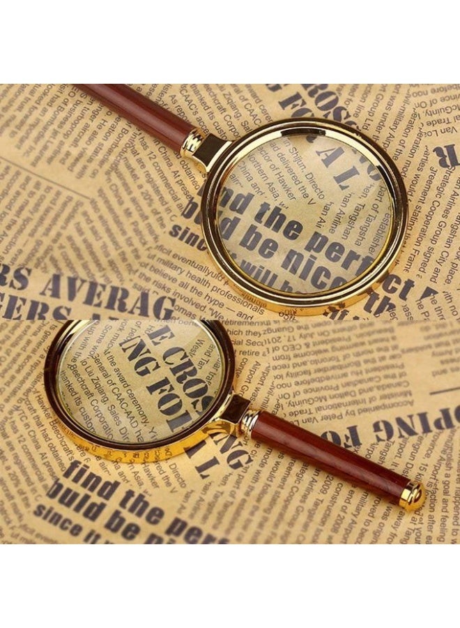 A handheld magnifying glass with an antique wooden handle for reading and examining books, coins, insects, rocks, maps, and crossword puzzles. - Image 2