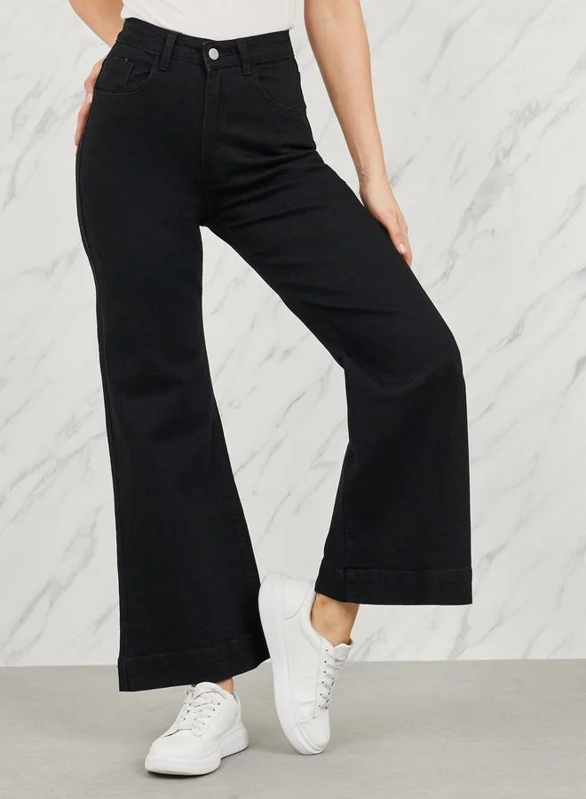 Styli High Rise Flared Hem Ankle Length Jeans