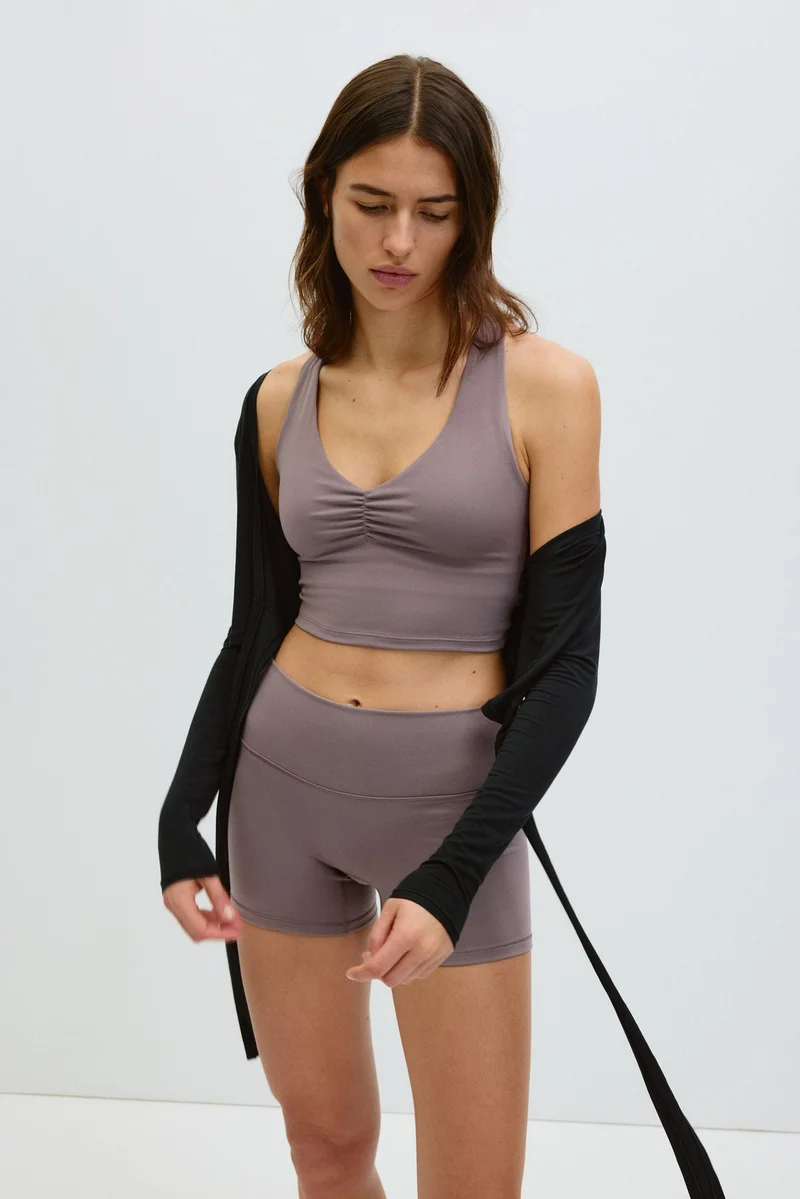 H&M  Medium Support Sports bra with SoftMove™ for Women | Best Price UAE