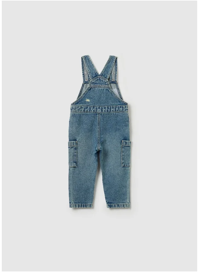 او في اس Denim dungarees with abrasions