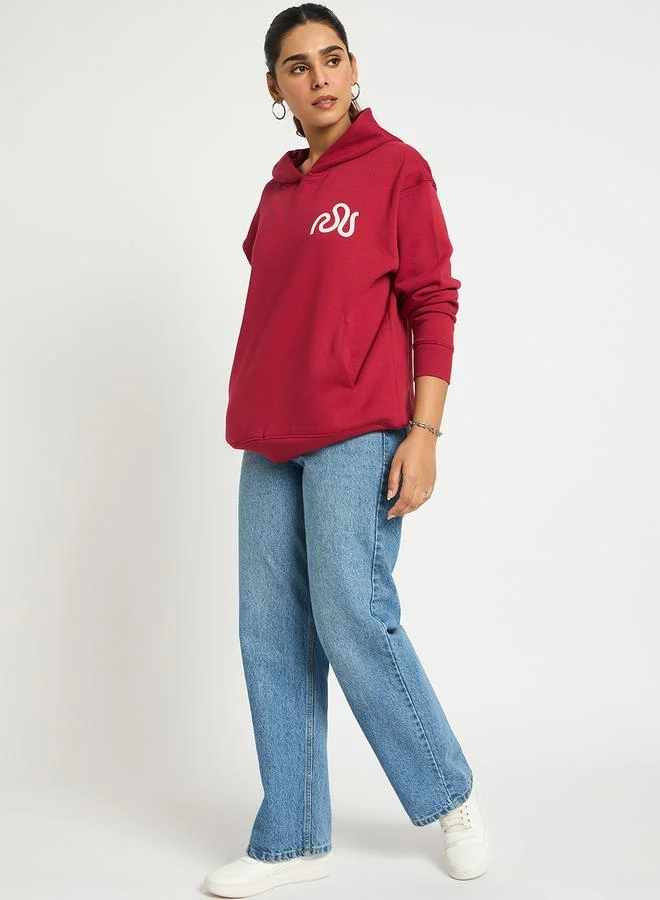 Femmella  Red Oversized Fleece Graphic Hoodie for Women | Best Price UAE