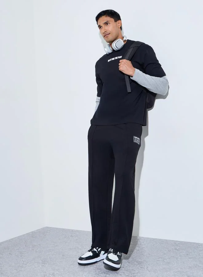 ستايلي Men's Black Oversized Joggers with Badge Detail