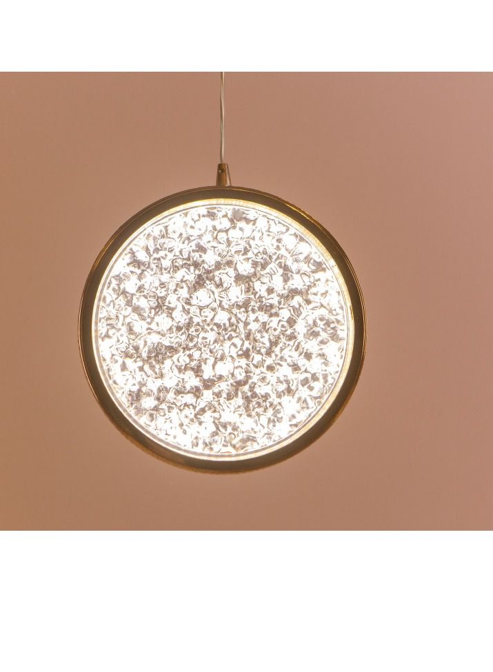 A simple circular chandelier hanging with a luxurious gold frame from Yocandel