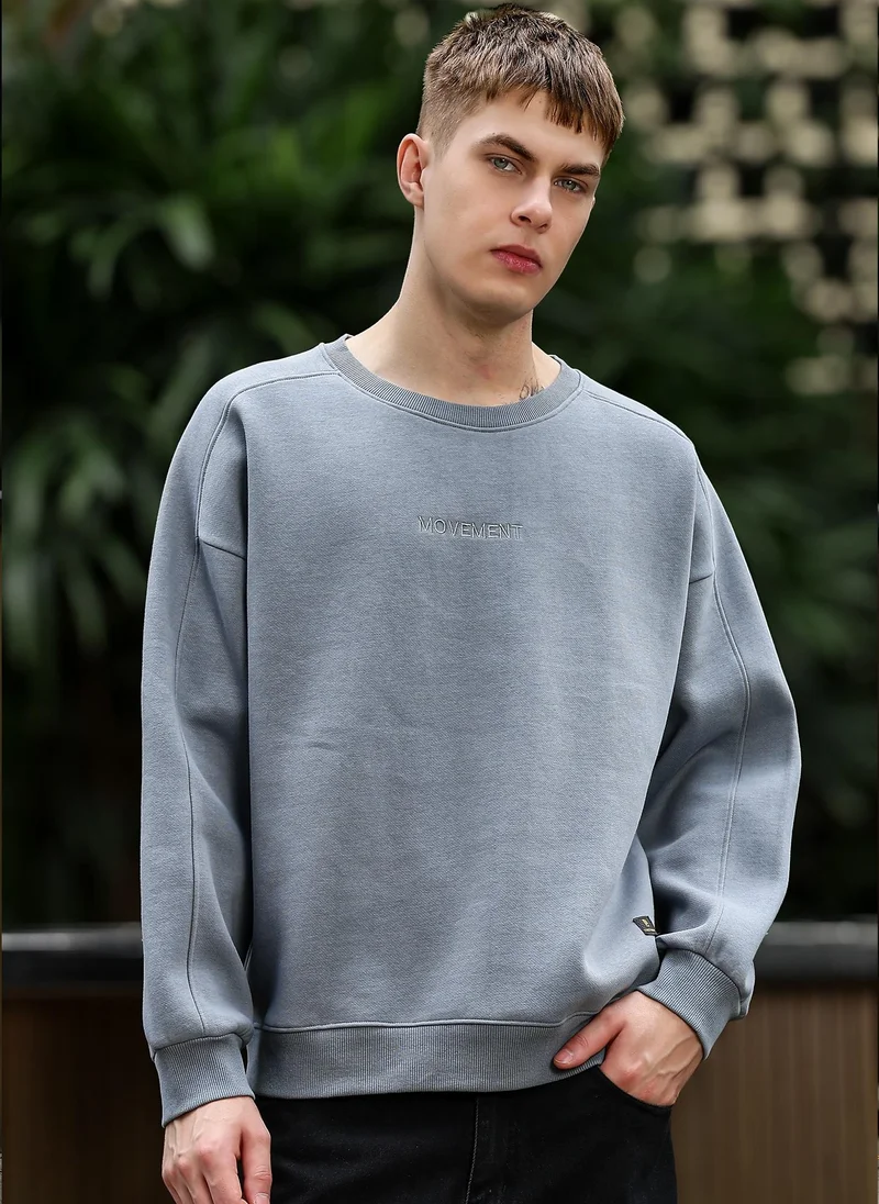 مانياك سويت شيرت رجالي رمادي فاتح بياقة دائرية وأكمام طويلة من القطن الصوفي