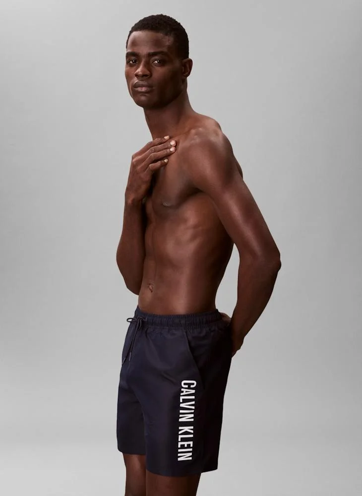 CALVIN KLEIN  Medium Drawstring Swim Shorts for Men | Best Price UAE
