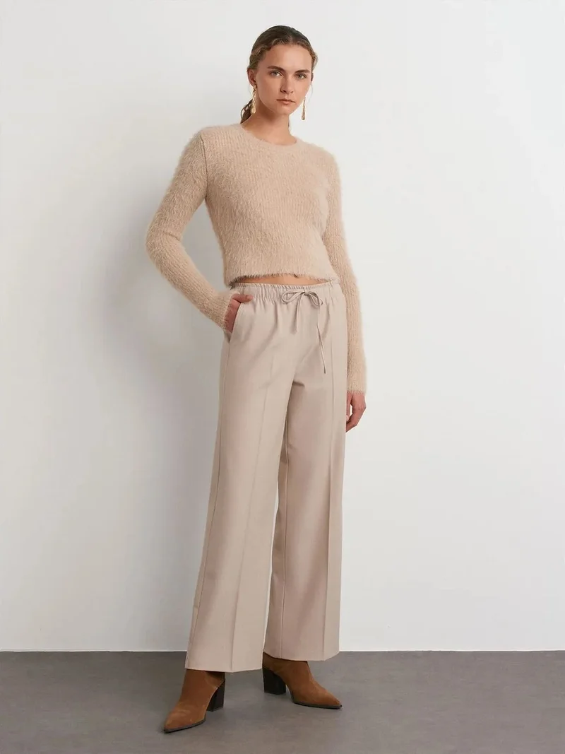 ديلفين Dilvin Wide-Leg Crepe Trousers
