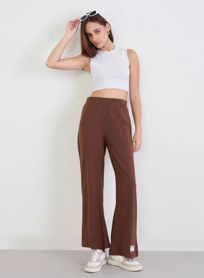 Styli Women Brown Flared Leg Trousers