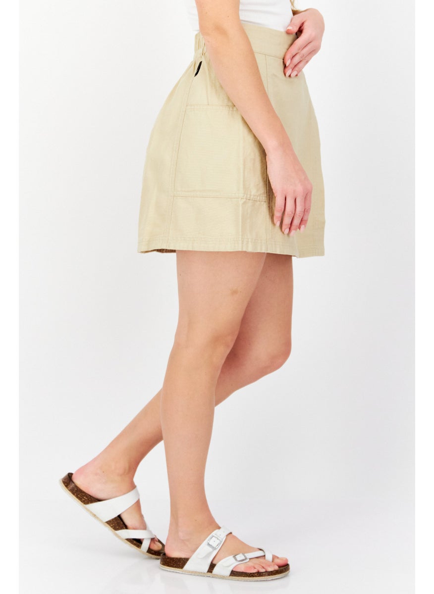 PUMA Women Sportswear Fit Brand Logo Outdoor Mini Skirts, Tan  - Image 4