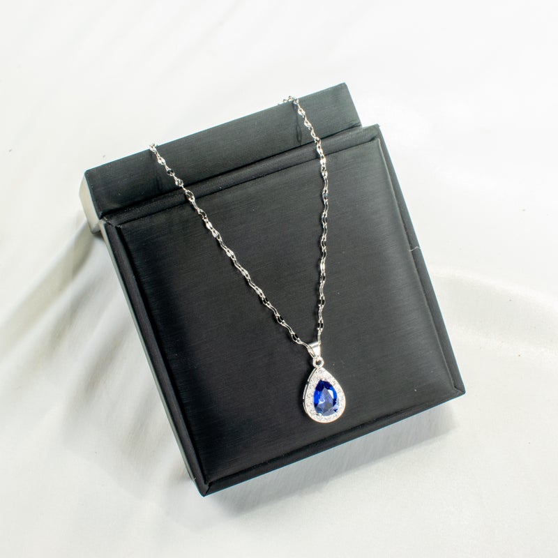 سلسلة أستانليس ستيل فضي مع دلاية شكل قطرة مياه زرقاء مرصعة بفصوص الزيركون - Image 1