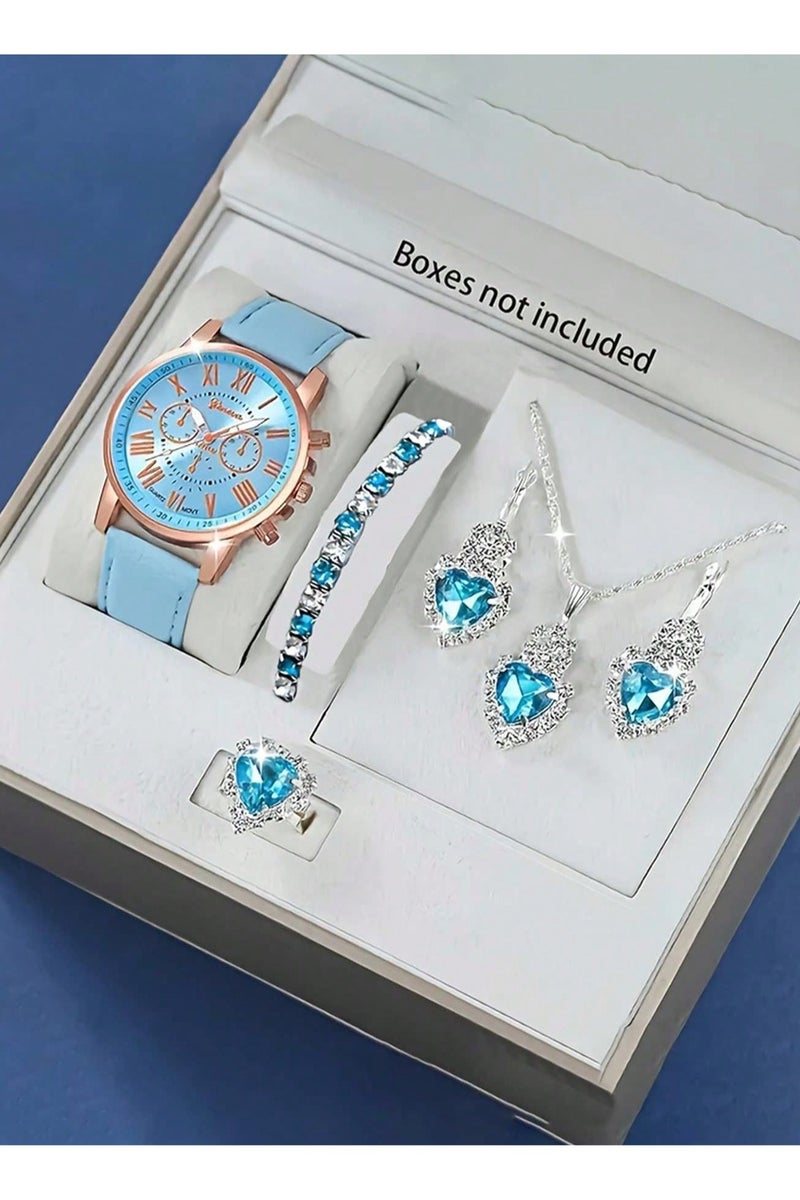 Geneva Girls' accessory set consisting of 5 pieces, including a watch, bracelet, necklace, earrings, and ring in silver color, adorned with blue gemstones in a cute heart design. Rust-resistant set, perfect for gifting to a loved one, as a graduation gift, birthday gift, and for all special occasions. Box not included. - Image 1