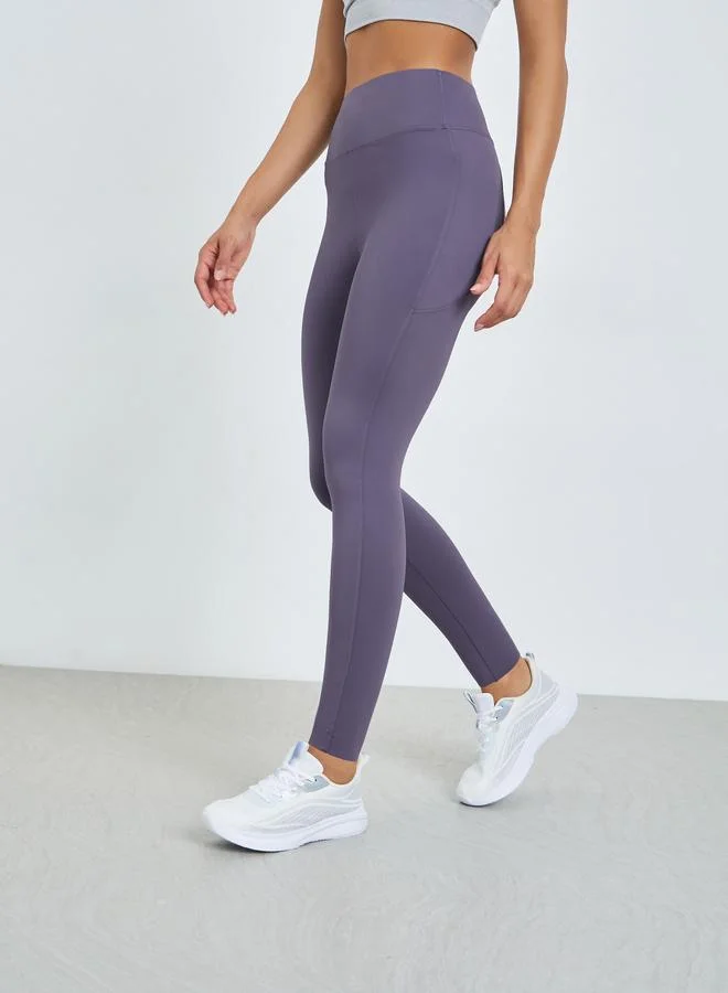 Styli Active Purple Broad Waist Side Pocket Leggings