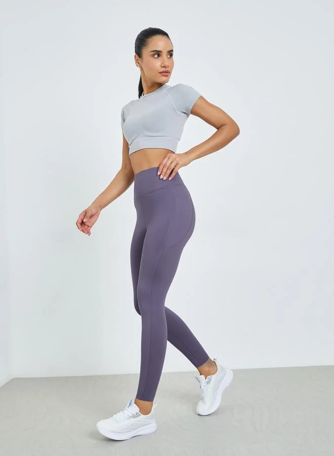 Styli Active Purple Broad Waist Side Pocket Leggings